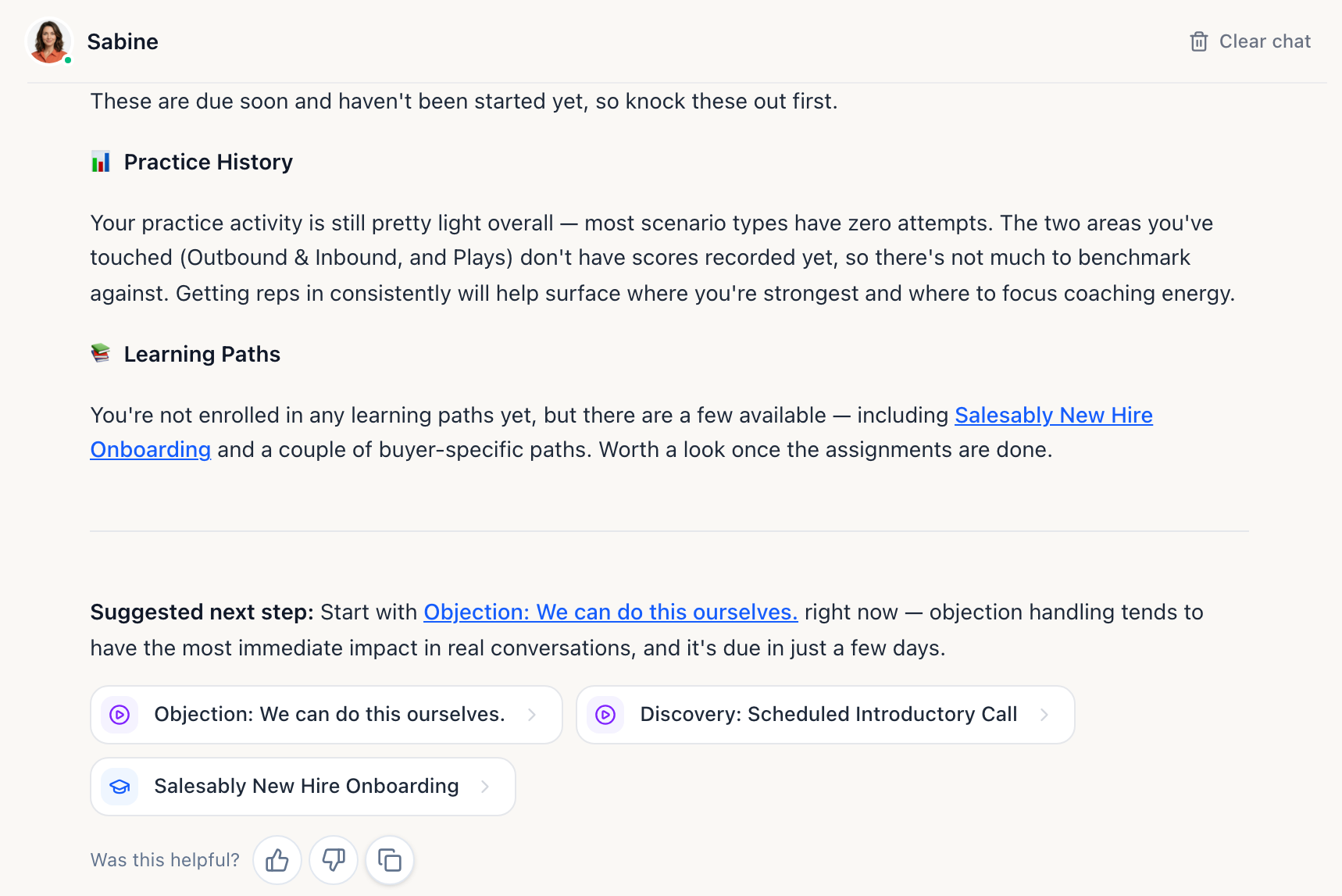 Sabine's answer on the Salesably home screen with inline links to a Learning Path and an objection assignment, deep link chips, and thumbs up, thumbs down and copy controls